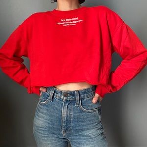 Cropped terrycloth sweatshirt with Paris graphic.